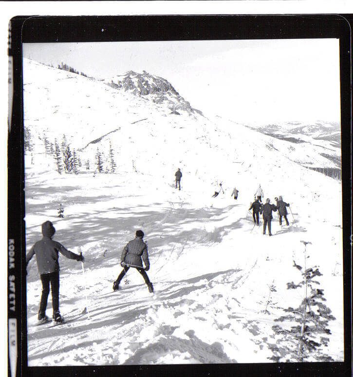 Skiing off top of T bar